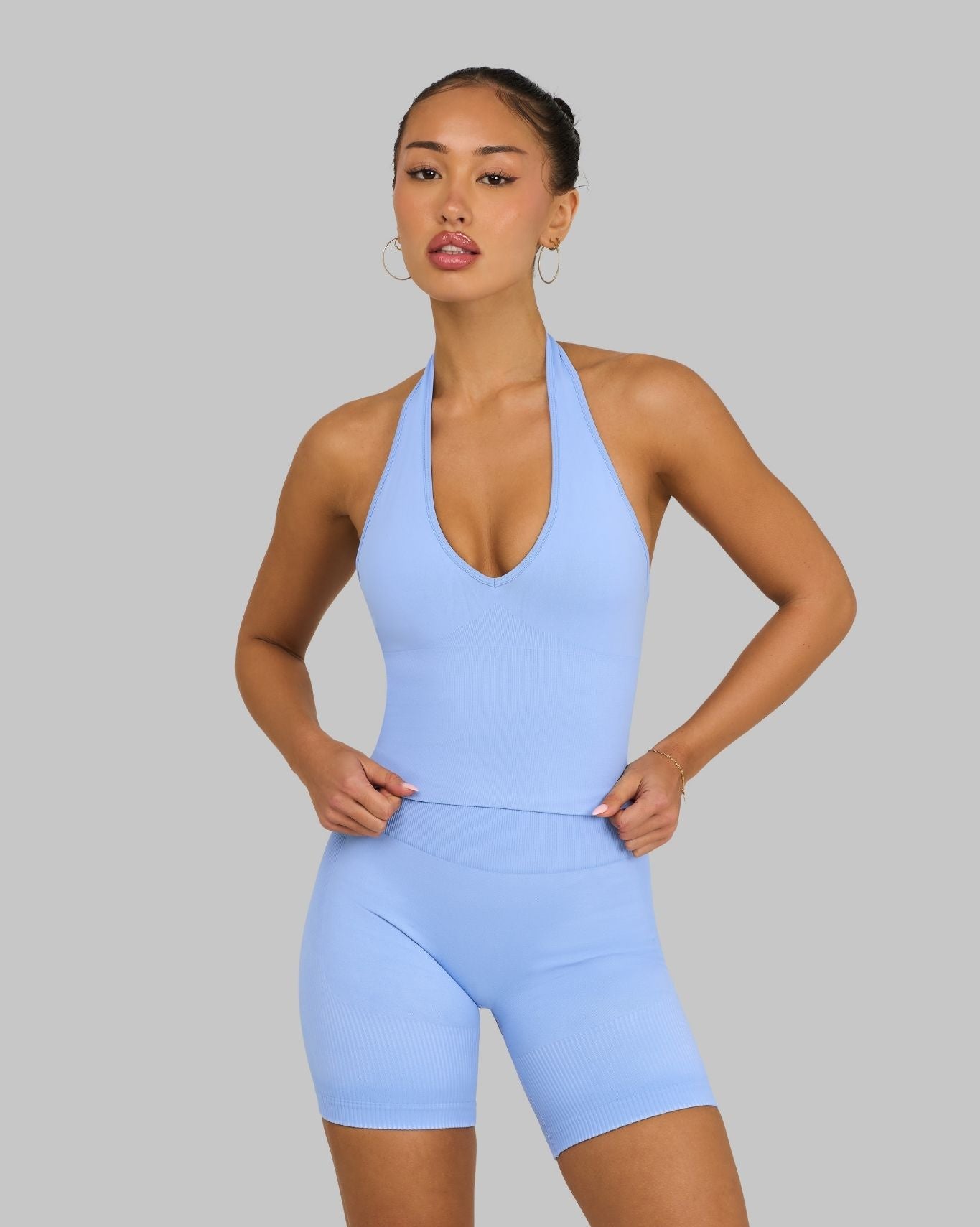 Lottie is 5’3” and wears a size XS.