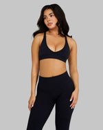 Alex is 165cm and wears a size S.