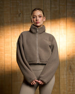 Tayla is 5’7” and wears a size S.