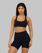 Alex is 165cm and wears a size XS.