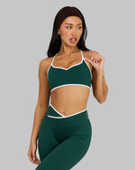 Lottie is 160cm and wears a size XS.