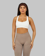 Alex is 165cm and wears a size XS.