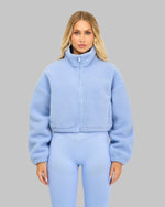 Abby is 5’6” and wears a size S.