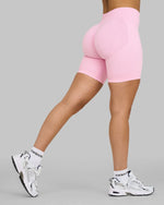 Alex is 5’5” and wears a size S.