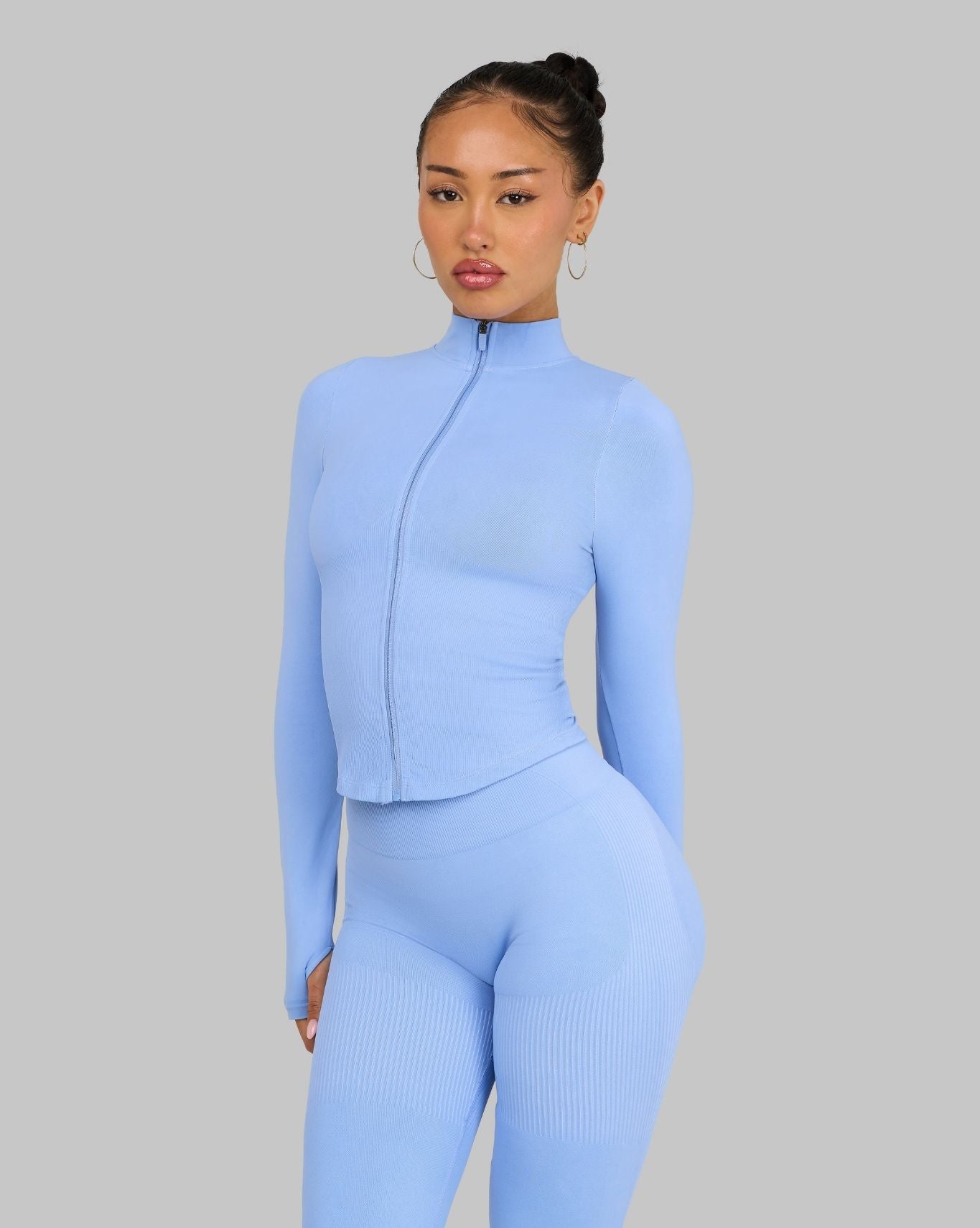 Lottie is 5’3” and wears a size XS